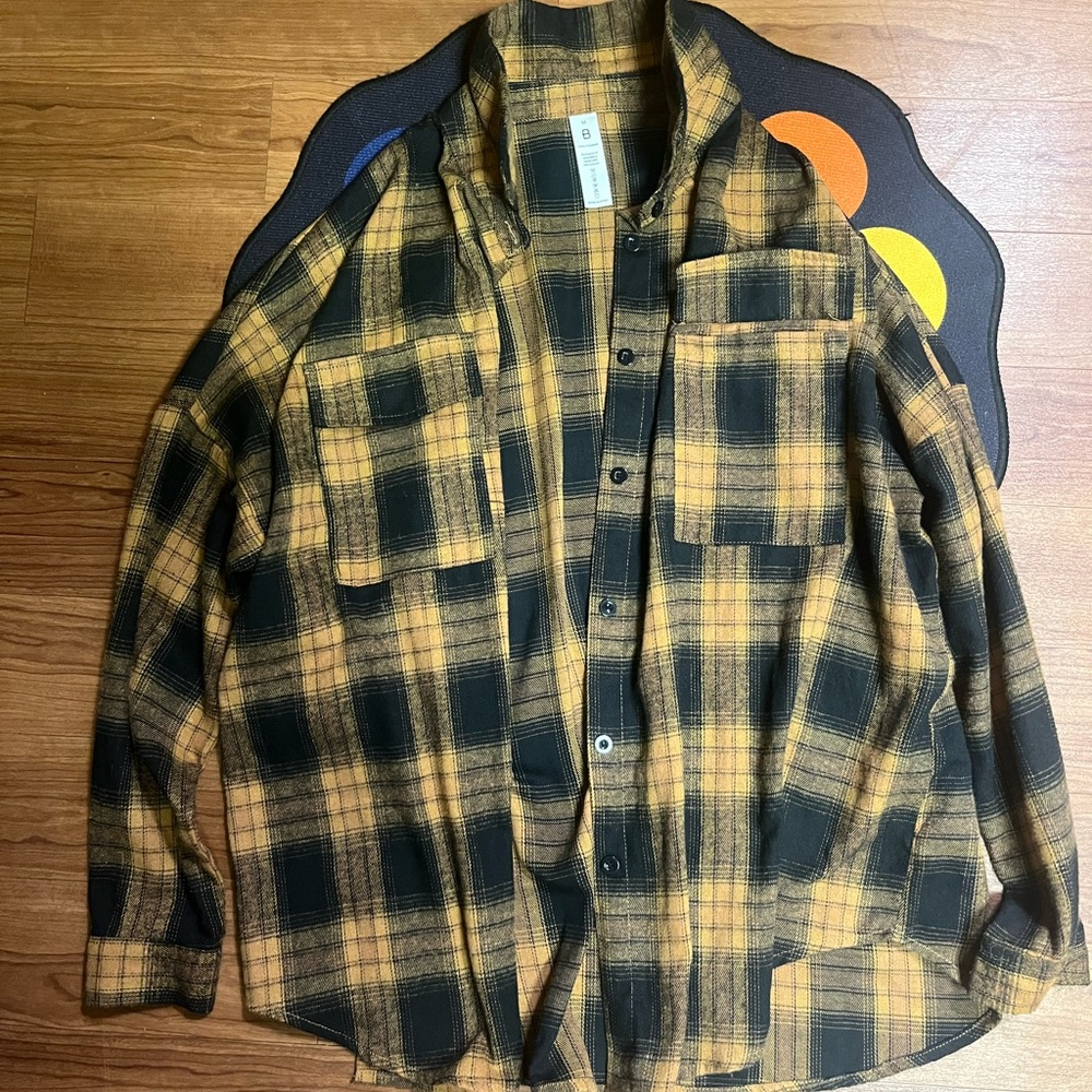 Brownish yellow and black flannel Size medium